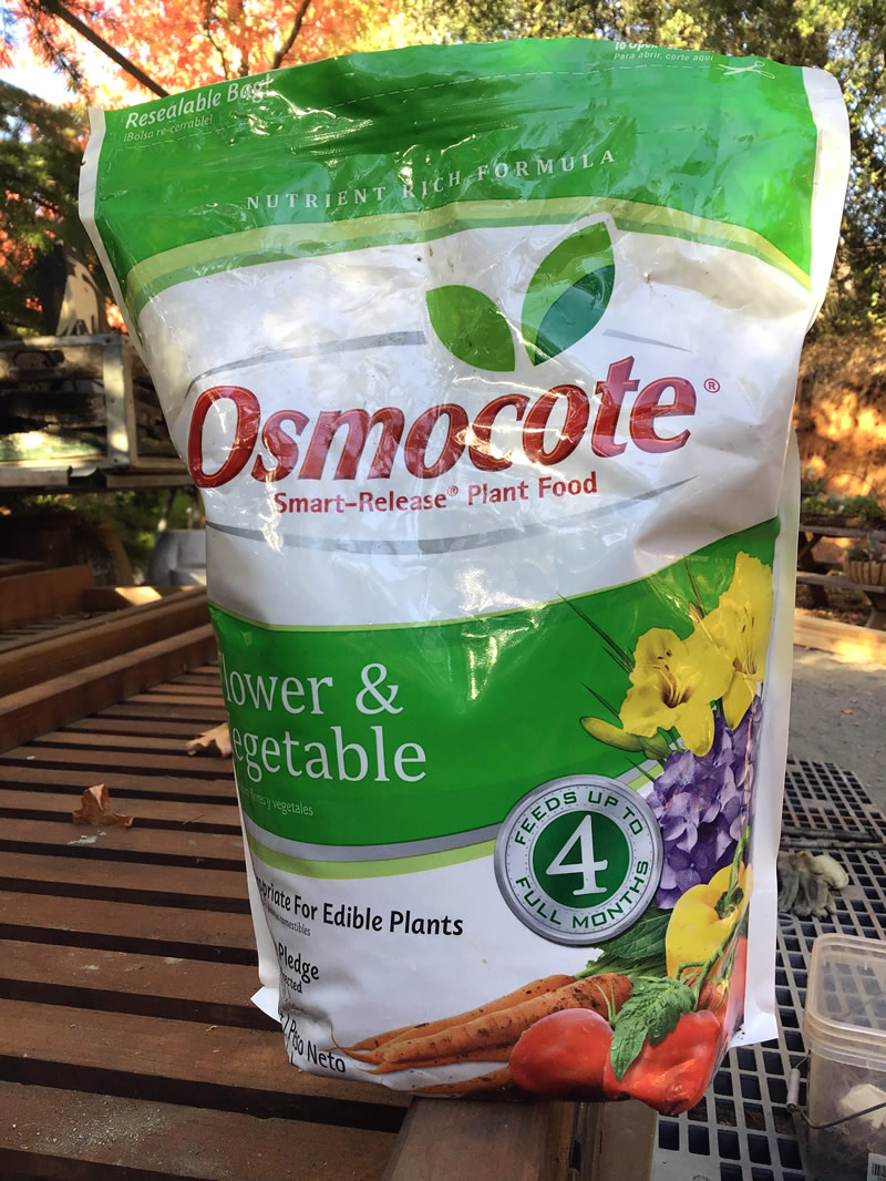 Bag of Osmocote plant fertilizer