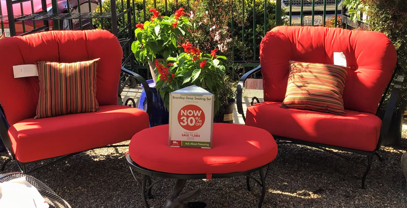 Red outdoor furniture set, chairs and table.