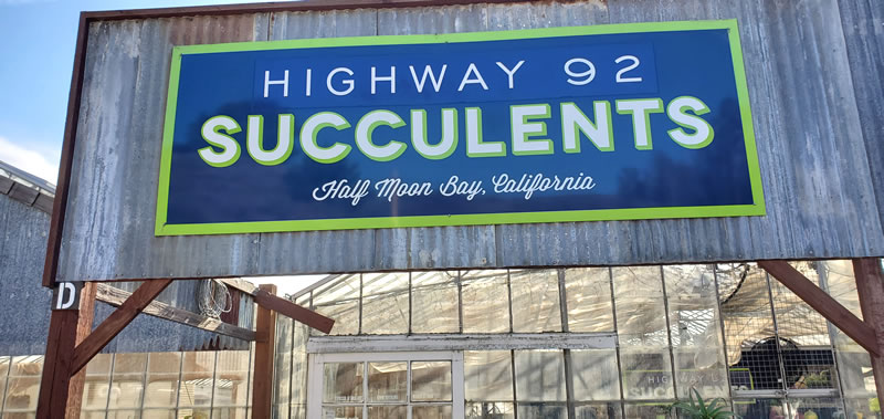 Front of building with sign Highway 92 Succulents