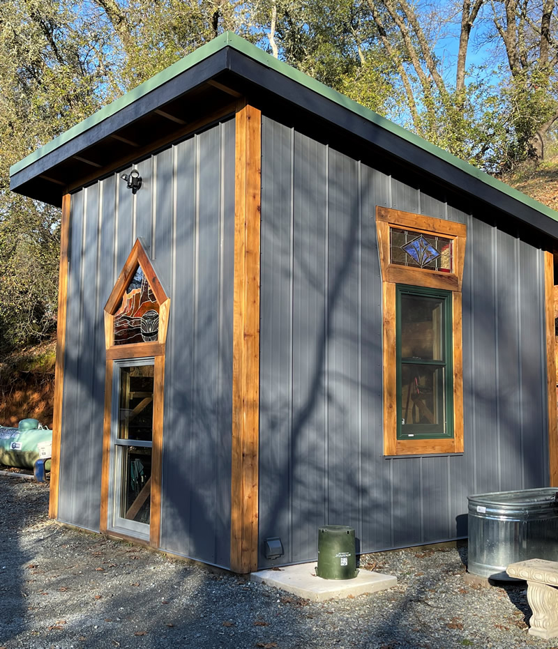 Picturesque gray-sided shed exterior