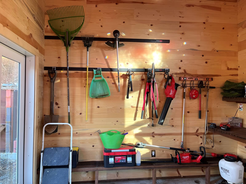 Interior wall with hanging garden tools
